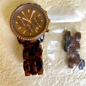 Authentic in good condition. Needs new battery.